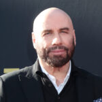 John Travolta’s Surprise Entrance Sends Audience Into Frenzy