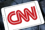 CNN Star Fires at Trump on Air CNN Logo on Tablet