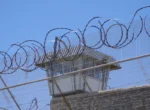 10 Dead in Prison Riot Prison Security Fence Razor Wire